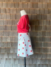 Load image into Gallery viewer, 1960s White Vinyl Mini Skirt with Red Embroidered Flowers